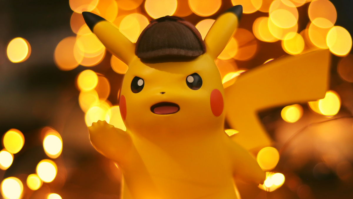 Blog post image for "Will PSA grade a fake card". Showing a photo of detective Pikachu