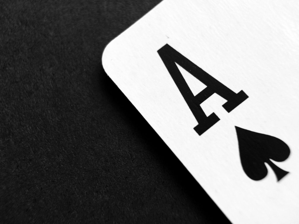 Image of an ace of spades and its corner.